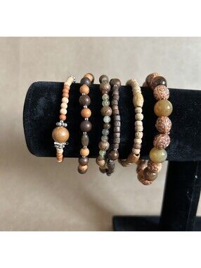 Set of 6 dark and light wooden stretch bracelets of different styles